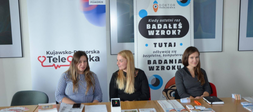 Foto. przedstawiające stoisko informacyjne